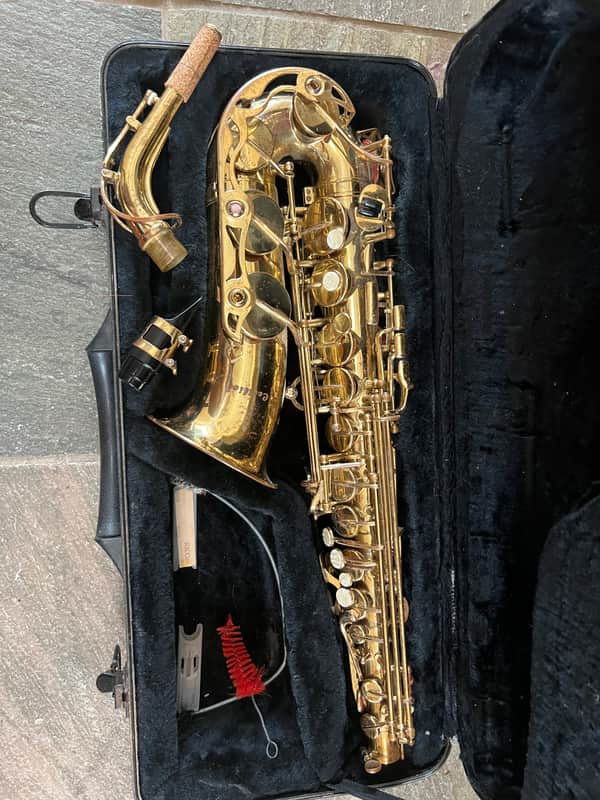 Alto Saxophone with case and mouthpiece image 1