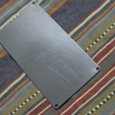 used Boss bottom plate (NO: rubber padding,label,serial number) for compact sized pedal - specifically from mid 1980s - metal, OUTER side: semi-gloss gray fiish / INNER side: flat gray finish -- back end has factory made small cut out for power jack image 9