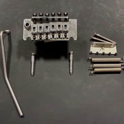 FLOYD ROSE® MADE IN GERMANY 80's CHROME "NFT" TREMOLO WITH MOUNTING HARDWARE. image 1