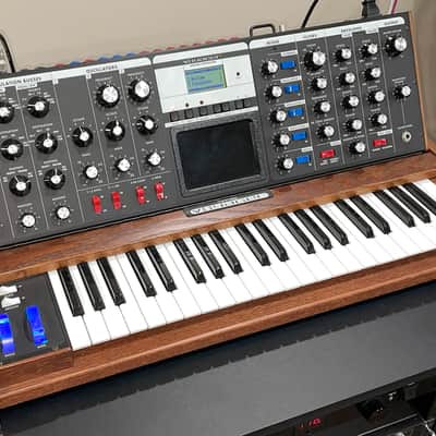 Moog Minimoog Voyager with custom flight case