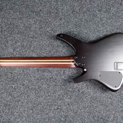 AGUDA Black hole 7 string Trans Black headless guitar image 9