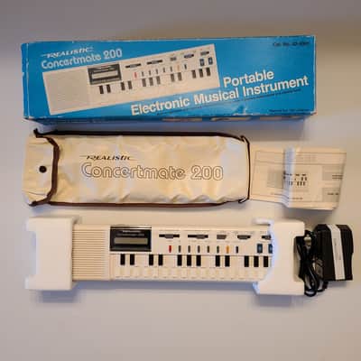 Realistic Concertmate 200 (Casio VL-1 rebadge) with power adapter, box and case White image 1