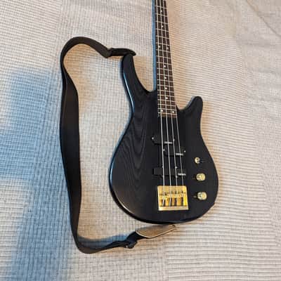 Samick One-piece bass guitar 1990s - Black Woodgrain, Brass Hardware image 1