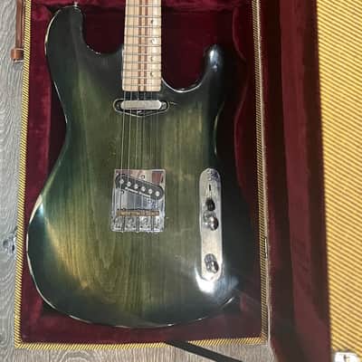 Wanderkauven Electric guitar - Transparent green burst finish with visible wood grain image 1