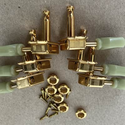 Epiphone- Vintage Style tuners, 3x3, Gold w/pearloid buttons image 2