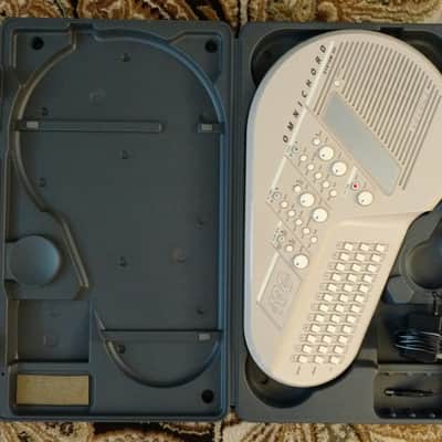 Suzuki Omnichord OM-100 Synthesizer w/ Case image 6