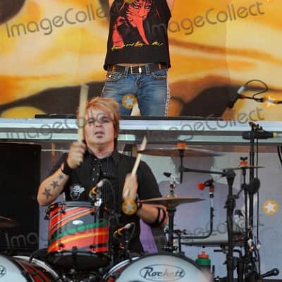 Rikki Rockett's Poison, Rockett Drum Works 2011 Tour Set. Maple/Carbon Fiber 18x22 (x2) 14.5x16, 12.5x14, 9.5x12. MultiColor Stripe Wrap image 6