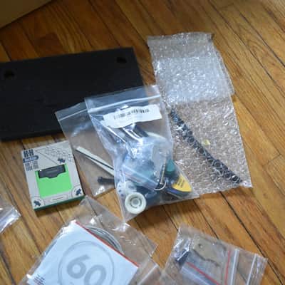 Mixed guitar and gear accessory lot, over 50 items, hardware , strings, tools, pickguards, ect. image 11
