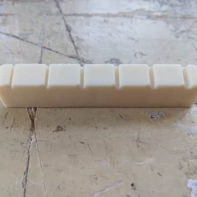 Unbranded Plastic Guitar Nut 1960s - White image 1