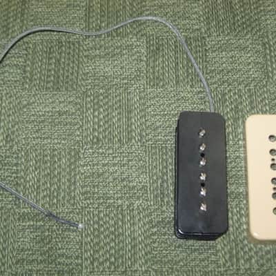 mostly very clean 1990s Gibson P-100 Soapbar pickup with Creme Cover (but can sell with black cover instead) NO mounting screws 6.3k - ideal for NECK position (2 conductor, solder connect) a P100 is a stacked humbucker that's hum-cancelling image 3
