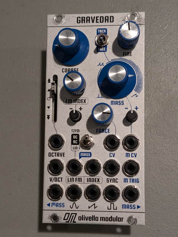 Olivella Modular Gravedad