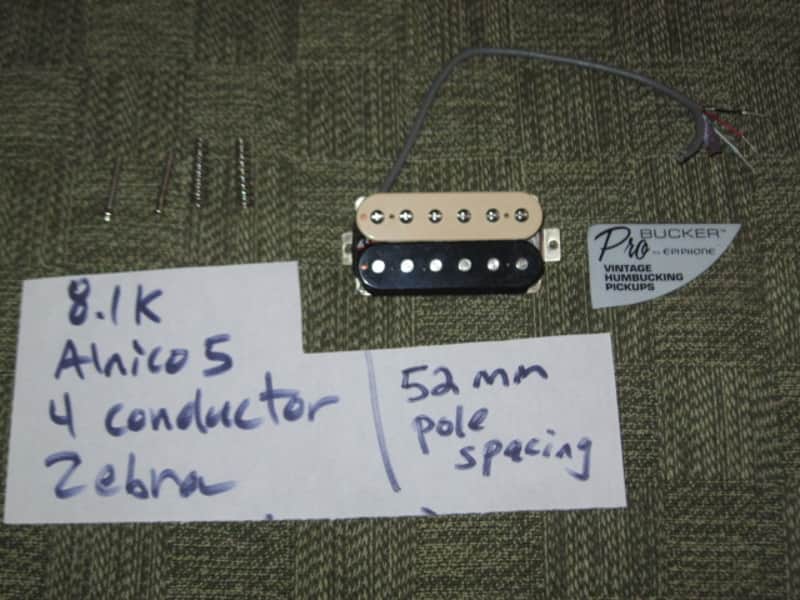 ONE new old stock very near A+ Epiphone ACPNHZCB-4 Alnico Classic Pro Bridge Humbucker, Zebra, 8.1k - Alnico V, solder connection, 4 conductor + screws & springs (from 2023) part of Epiphone's Pro Series Line of Humbuckers (which is called ProBUCKER) image 1