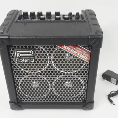 Roland MICRO CUBE RX Battery Powered Guitar Amplifire Built-in Effector, Tuner 2x2.5W 4x4" Combo