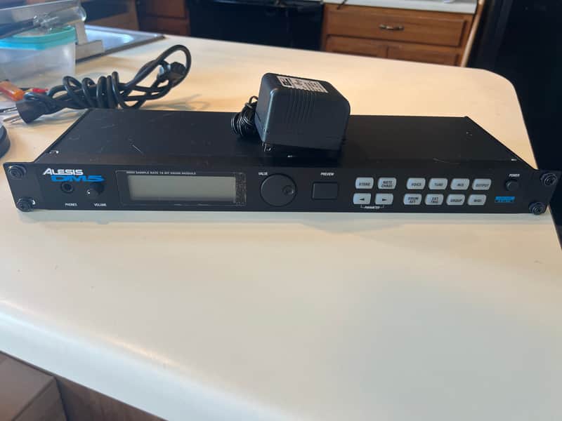 Alesis DM5 Electronic Drum Module in near new condition with power supply and rack mount bolts/washers. image 1