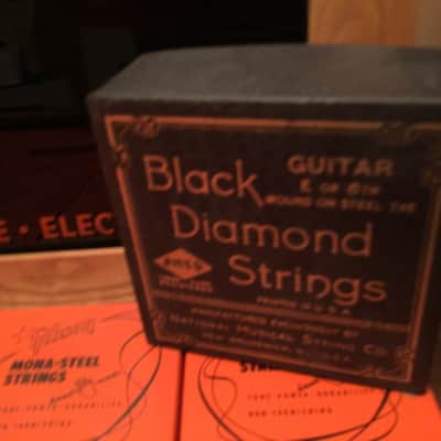 Gibson String Display case 1950's -60's orange and black full of unused strings image 3