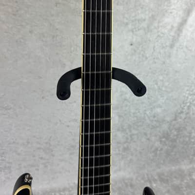 Washburn X-Series Pro X50PROFE electric guitar in transparent black image 14
