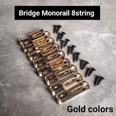 Bridge monorail 8 string multiscale guitar in Gold image 1