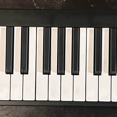 Alesis V49 49-Key USB MIDI Controller with Drum Pads