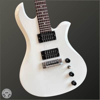 B.C. Rich Mockingbird 1000 JE ML 1999 Natural Japan | Reverb