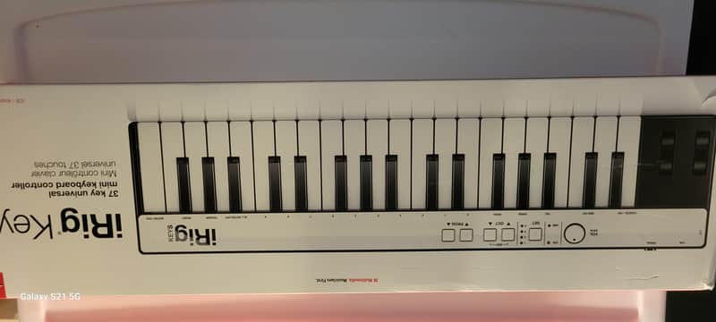 IK Multimedia iRig Keys Mini 25-Key Mobile MIDI Keyboard Controller 2010s - White image 1