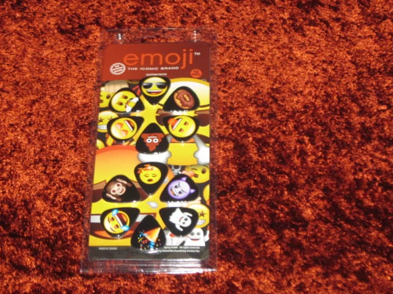new in package (old stock) Perri's Leather Ltd. / Perri's LP12-EMO5 emoji Guitar Picks - Med Gauge - Celluloid Plastic, 351 shape - but slightly curved (LP12EMO5) image 1