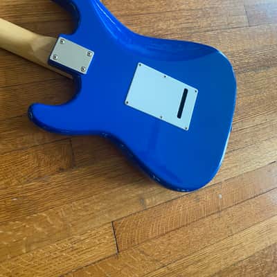 Bright blue Hondo Stratocaster electric guitar image 6