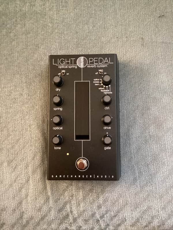 Black pedal with knobs and switches, labeled "LIGHT PEDAL" for reverb system.