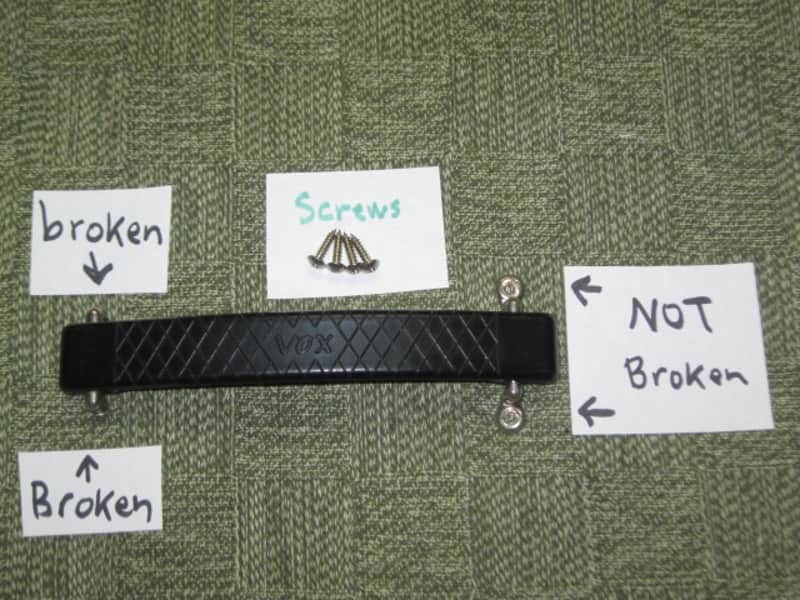 lite use (one mounting piece is broken) genuine Vox Black Plastic Dogbone Style Guitar Amplifier Handle with VOX logo and Diamond Pattern [Black hard - but flexible Plastic /  Metal Nickel mounting pieces (1 mounting piece is broken) + screws (from 2000) image 1