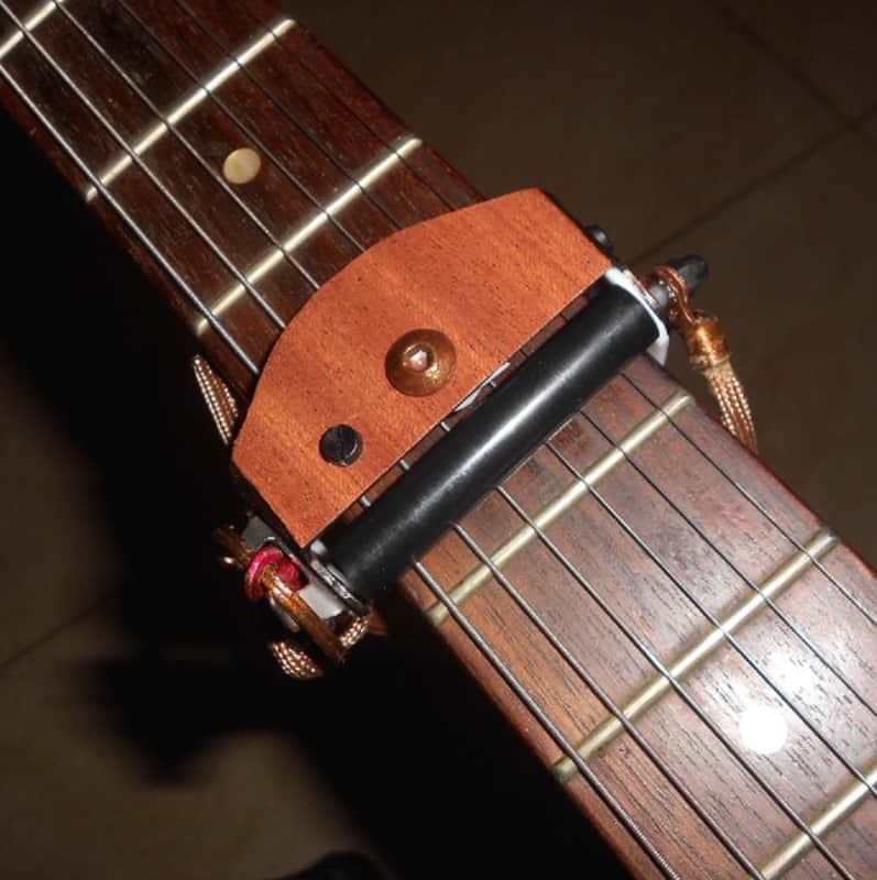 6th Finger Rolling Capo - brown real wood veneer. The fastest capo in the world ! image 1