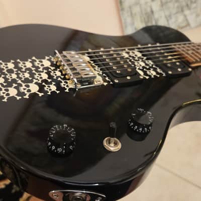 First Act ME543, Black with skulls, VG image 15