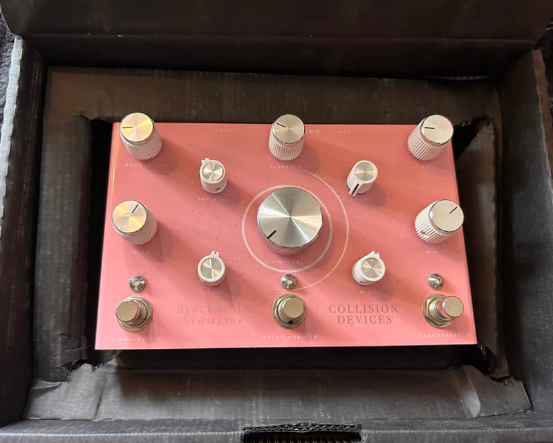 Collision Devices Black Hole Symmetry