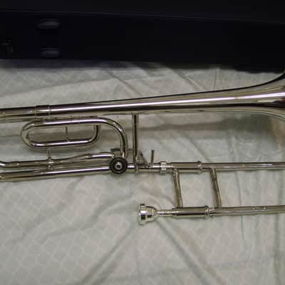 Silver Trigger trombone, with case and mouthpiece image 4