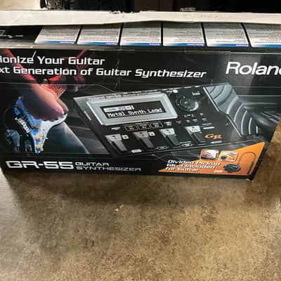 Roland GR-55GK-BK synthesizer module in excellent condition made in Taiwan with original Roland power supply, original long GK cable , original GK3 pickup & accessories, original manual all included , with original box .