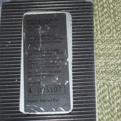used vintage DOD Performer Series BOTTOM PLATE ( screw holes are on 4 corner areas) NO: pedal/other parts - early 1980s - Metal Plate has Silver & Gray Finish / Stiff Black Rubber Padding (padding has ridges) has Label, underside sanded & repainted gray image 2