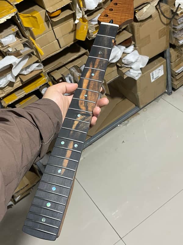 Striped Ebony Fretboard 22frets 5a Roasted flame Maple guitar neck Radius 12inch Round stainless steel 22 frets Roasted flame Maple guitar neck Striped Ebony fingerboard 25.5inch hole 10mm Radius: 12 inches. image 1