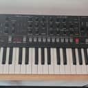 Sequential Trigon-6 49-Key 6-Voice Polyphonic Synthesizer 2022 - Present - Black with Wood Sides