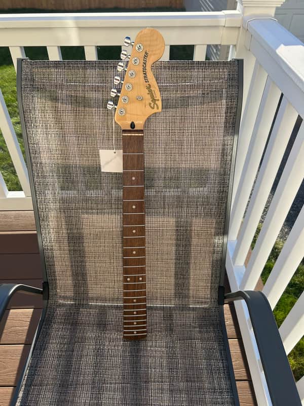 Squier Affinity Stratocaster guitar neck with neck plate new old stock 2021 - Indian Laurel image 1