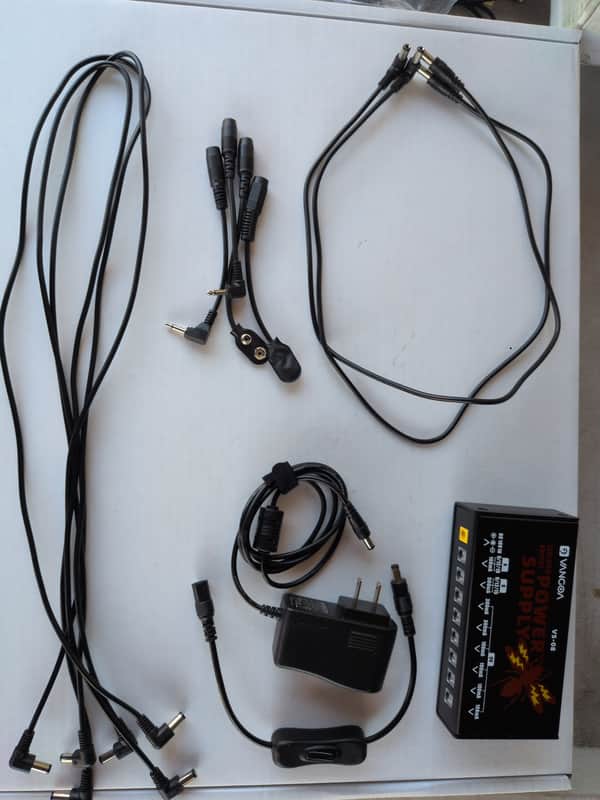 Vangoa Guitar Pedal Power Supply - 8 Isolated DC Output for 9V/12V/15V/18V Effects Pedal with Adjustable Voltage and extra adapeters - Black image 1