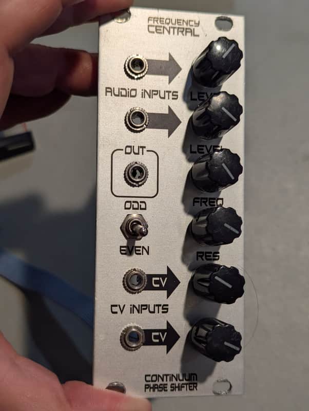 Frequency Central Continuum Phase Shifter