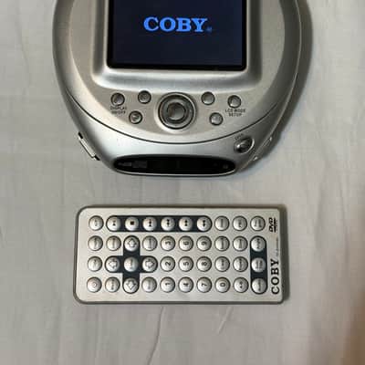 Coby Coby TF-DVD500 Portable DVD/CD/MP3 Player W/ Accessories image 1