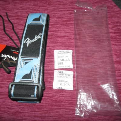 new with tags genuine Fender 2" Monogrammed Guitar Strap Black, Light Gray, and Light Blue - Fender part number: 099-0681-502, Fully adjustable length (39"-72") Woven Fender logo and guitar headstock design, polyester backing, black leather ends image 1