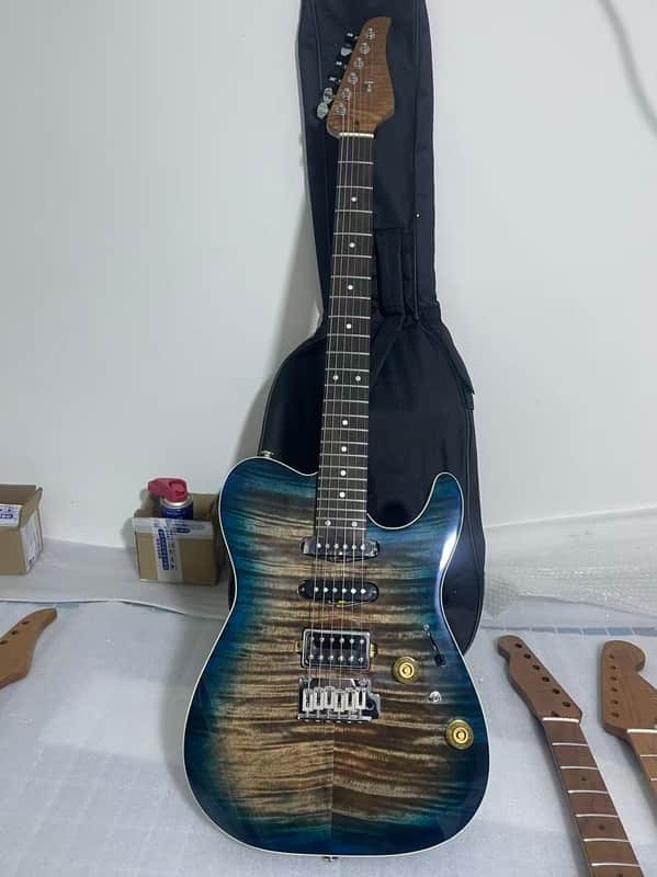 Vibrato system 24 frets Roasted flame maple neck Blue Gradient Flamed Maple Top Mahogany tele Electric guitar body SSH image 1