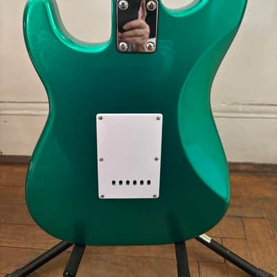 Custom Built 2026 guitar, Mahogany Body, Maple neck with laurel fingerboard. Metallic green body. Pro setup done play's great. Upgraded locking tuners, Matching Bridge image 5
