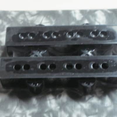 new in package A+ Allparts PC-0953-023, Pickup Cover Set for Jazz Bass / J Bass (2 piececs) Black, plastic (from 2020s) screws are NOT included- but they're availabe for sale upon request image 11