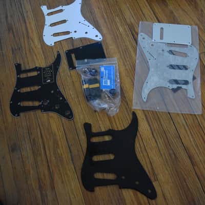 Mixed guitar and gear accessory lot, over 50 items, hardware , strings, tools, pickguards, ect. image 1