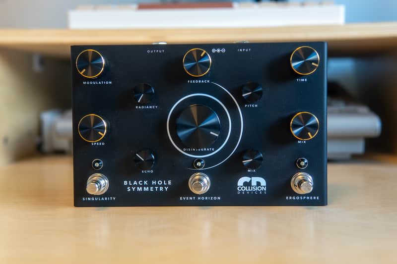 Collision Devices Black Hole Symmetry