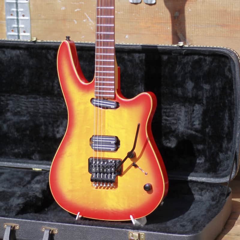 1990’s Godin Artisan ST-V Sunburst