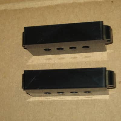 new + packaging (covers have some manufacturing imperfections) Allparts PC 0951-023 Black Pickup Cover Set (two individua covers) for Precision Bass / for P Bass - black, plastic, PC-0951-023 (never used, packaging opened to examine condition of covers) image 12