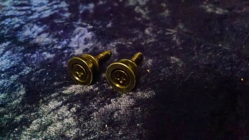 1980s ALLparts Black Strap Buttons image 1