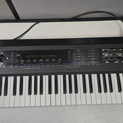 Roland D-50 61-Key Linear Synthesizer with Roland Gig Bag & Owners Manuals